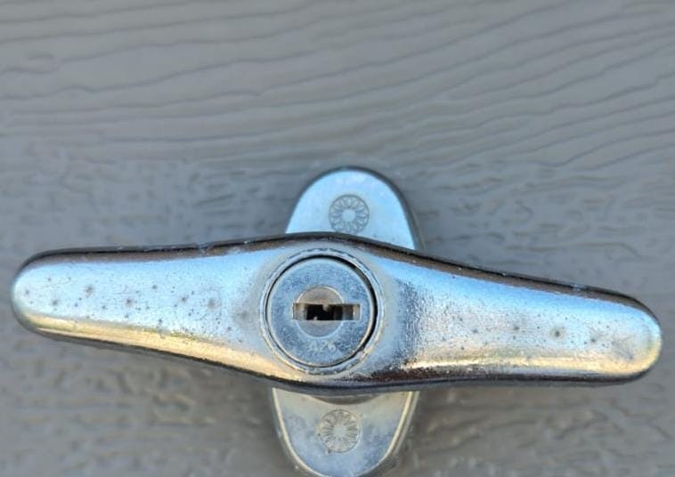 T-handle garage door lock that needed to be opened