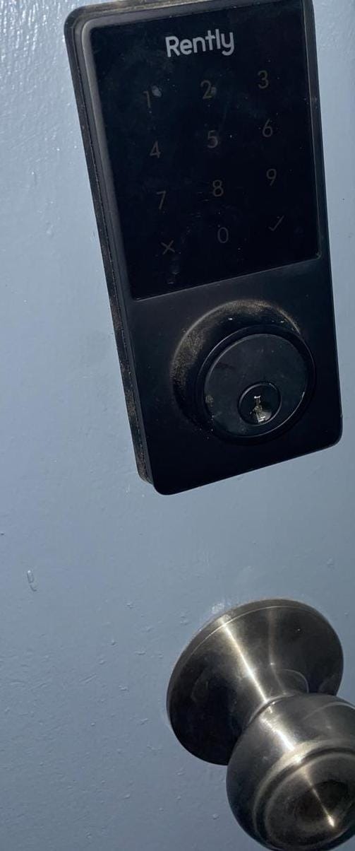 Smart lock keypad on a front door after a lockout