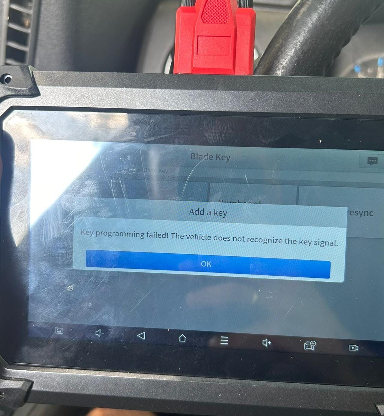Programming tablet adding a new key fob to a car